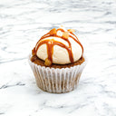 Carrot Cake Cupcake with cream cheese buttercream, caramel drizzle and toffee pieces