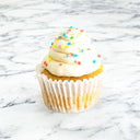 Vanilla cupcakes with vanilla buttercream and sugar sprinkles