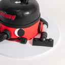 Red Henry Hoover Cake with fondant eyes, smile and hose