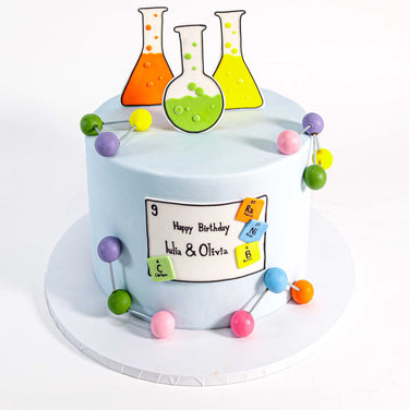 Free From Science Cake with fondant flasks, molecule models and a birthday plaque