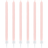 Six blush pink taper cake candles with white holders