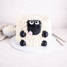 Fluffy Sheep Cake with piped buttercream wool and a fondant sheep face, with mini marshmallows