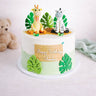 Safari Cake with fondant animals and leaves and a happy birthday plaque