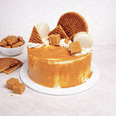 Mini Salted Caramel Cake with caramel buttercream, stroopwafel pieces, vanilla macarons and fudge