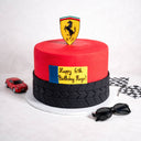 Free From two tier red Car Cake with a tyre tread design, racing shield and a birthday message, with a toy car