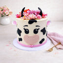 Cow Cake with a cow face, fondant details and silk flowers