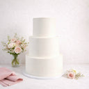 Three tier Smooth Wedding Cake in white icing, with pink and ivory roses