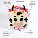 Cow Cake with labels showing the fondant details, flowers and message space