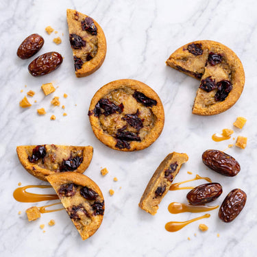 Sticky Toffee Cookies with Medjool dates and caramel sauce on marble