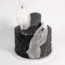Tombstone Cake with rustic black buttercream, ghosts, an RIP tombstone and a skull