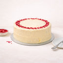 White Chocolate and Raspberry Cake topped with freeze dried raspberries
