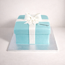 Tiffany & Co Box Cake, a cake made to look like the blue gift box with a white ribbon and tag