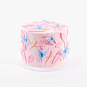 Butterfly Cake with pink buttercream, wafer paper butterflies and gold sprinkles