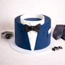 Free From Suit Cake decorated as a dinner jacket, surrounded by men's accessories