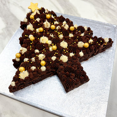 Brownie Christmas Tree made from chocolate chip brownies, with vanilla swirls, gold pearls and a gold star