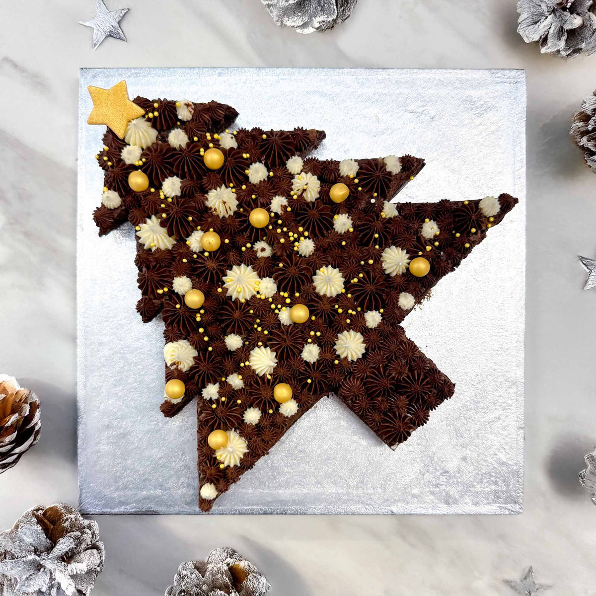 Brownie Christmas Tree with chocolate and vanilla buttercream, gold sprinkles and a star