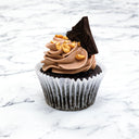 Chocolate Hazelnut Cupcake with chocolate buttercream, golden crunchy pieces and a dark chocolate shard