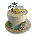 Custom beach cake with a camper van topper, palm trees, a sea turtle and edible sand