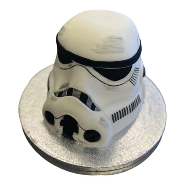 Custom 3D cake shaped like a Stormtrooper helmet