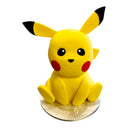 Custom Cake featuring a Pikachu design with yellow fondant, black-tipped ears, and red cheeks, personalized with Casey and number 5 on a silver cake board.