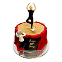 Custom Cake: A stage-themed 80th birthday cake for Jenny featuring fondant figures, red drapes, and wood-plank top. Contact before purchasing for details.