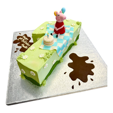 Custom Cake: A grassy picnic-themed 1-shaped birthday cake featuring Peppa Pig, a checkered blanket, and a small cake for Hunter's first birthday.