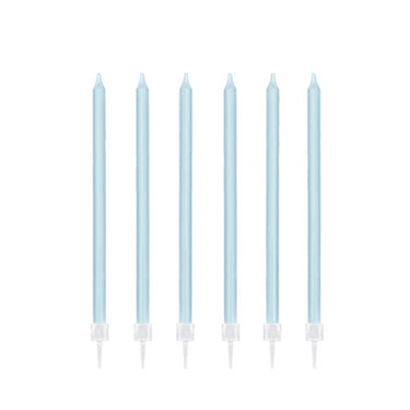 Six pale blue taper cake candles with clear holders