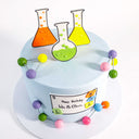 Science Cake with fondant chemistry decorations, biscuit flasks and molecule models