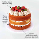 Victoria Sponge Cake filled with vanilla buttercream and jam, topped with rosettes and fresh berries