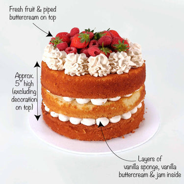 Free From Victoria Sponge Cake with jam and buttercream, topped with piped buttercream and fresh berries