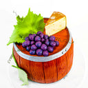 Wine Barrel Cake made to look like a wooden barrel, with fondant grapes, leaves and a cheese wedge