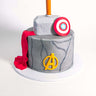 Free From two tier Marvel Avengers Cake with Thor's hammer and cape, Captain America's shield and Avengers logo