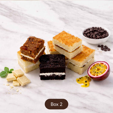 Three cake slices from the Sample Taster Box, including chocolate and carrot cake