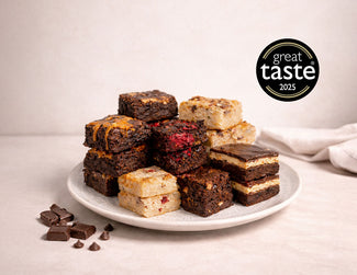 Harry Batten brownies and blondies stacked on a plate, with a Great Taste 2025 award badge