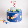 Space Cake with blue fondant, stars, planets, a 3D rocket and an astronaut on the moon