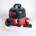 Henry Hoover Cake made to look like the red and black vacuum cleaner