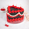 Halloween Heart Cake with charcoal buttercream, red rosettes and cherries