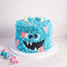 Free From gluten friendly Monster Cake with blue buttercream fur, fondant eyes and teeth and yellow horns