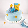 Mini Train Cake with a blue fondant train, gold stars, piped dots and yellow buttons