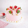 Mini Strawberry Macaroon Cake with pink buttercream, white swirls, fresh strawberries, macarons and gold pearls