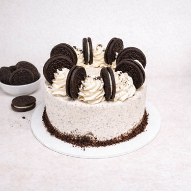 Mini Oreo Cake with cookies and cream buttercream, piped rosettes and Oreo biscuits