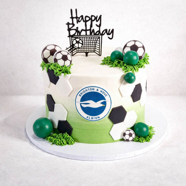 Free From Football Cake with a club crest, football pattern, piped grass and a happy birthday topper