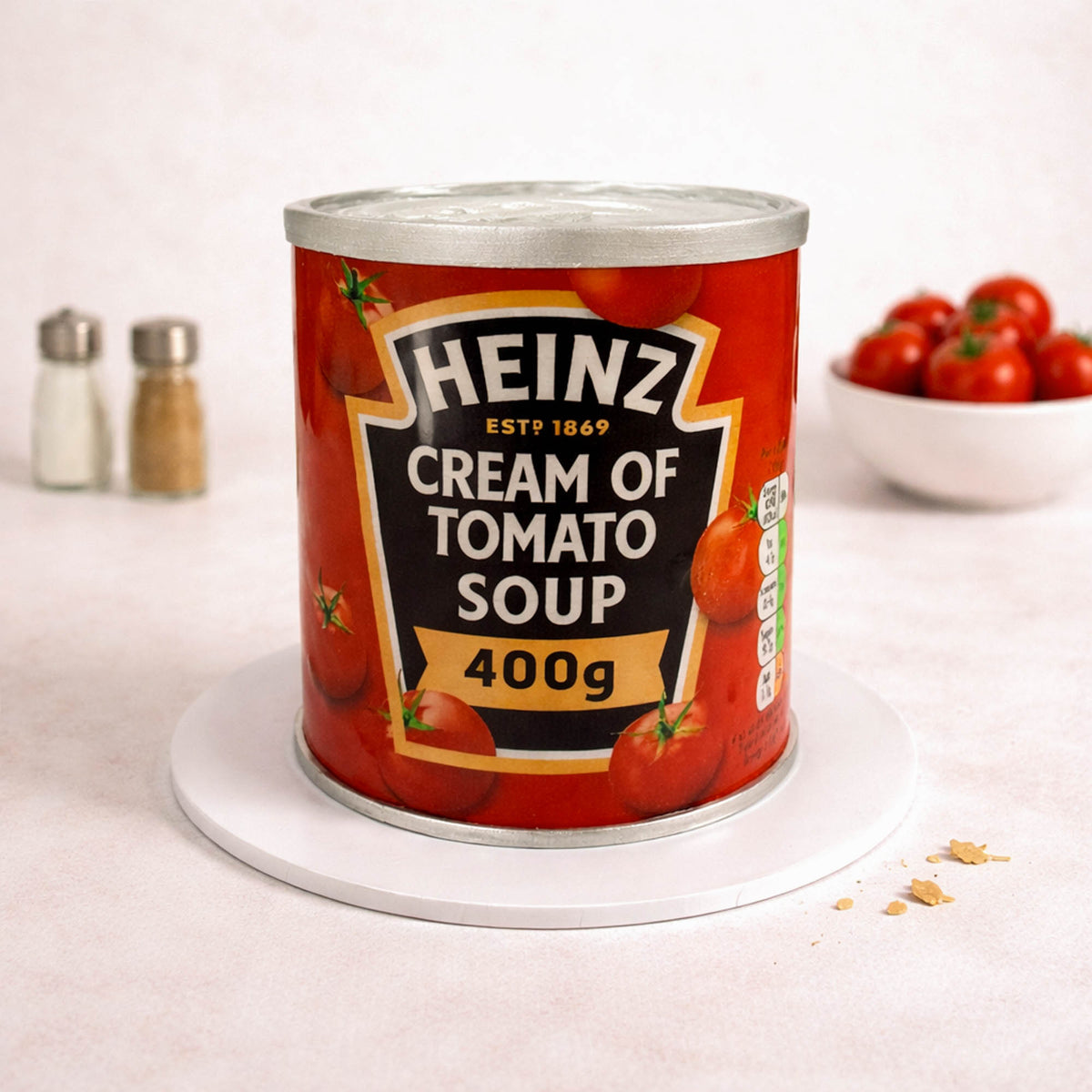 Soup Can Cake made to look like a tin of cream of tomato soup, with cherry tomatoes