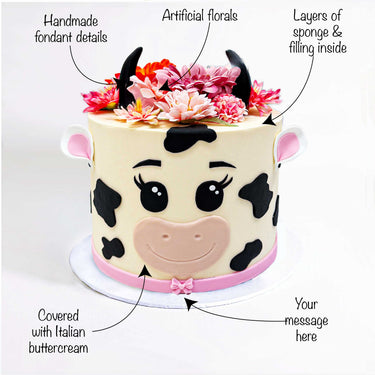 Cow Cake with labels showing the fondant details, flowers and message space