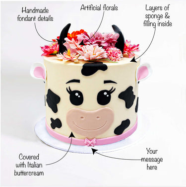 Cow Cake with labels showing the fondant details, flowers and message space