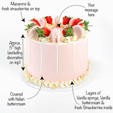 Gluten friendly Free From Strawberry Macaroon Cake with white chocolate drip, strawberries, macarons and swirls