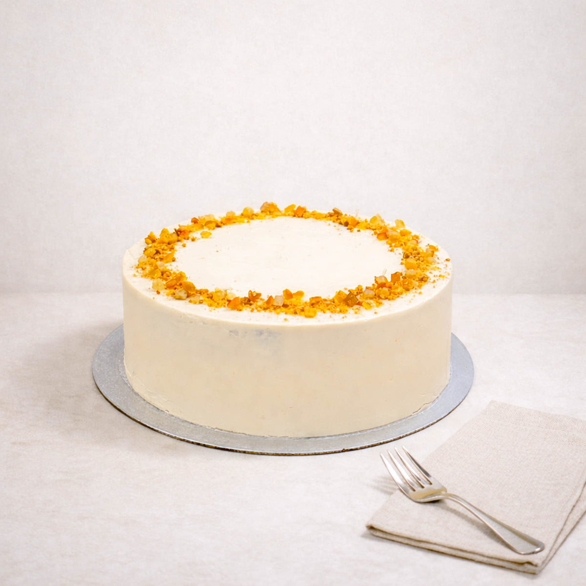 Carrot Cake with orange buttercream and golden honeycomb pieces