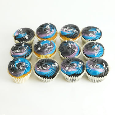 12 Galaxy Cupcakes with galaxy swirl buttercream and star sprinkles